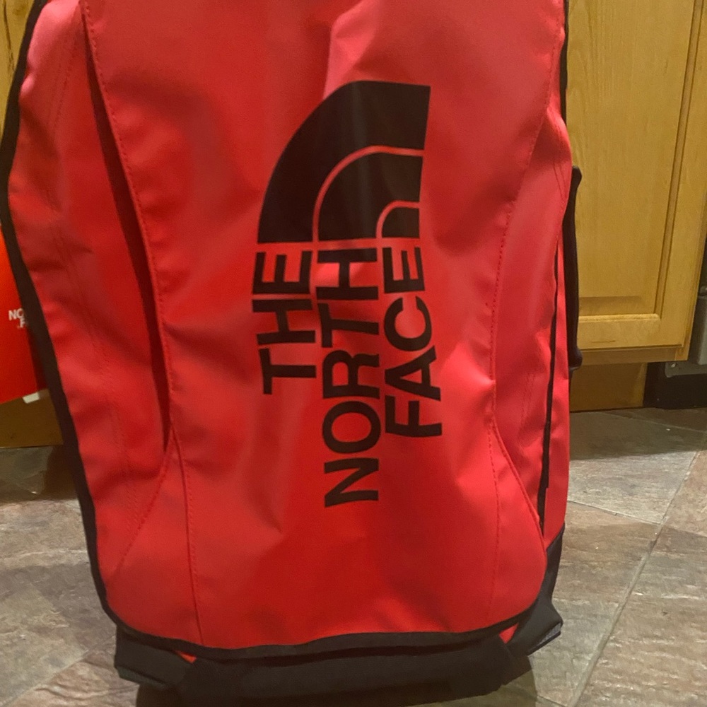 North face rolling thunder 22” luggage in red NWT!
